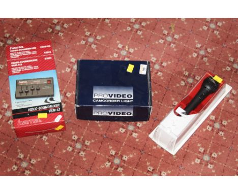 A boxed Hama 46036 dynamic microphone, A pro video cam corder light and Hama video sound mixer VSM/512