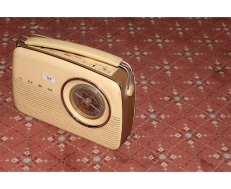 A vintage cream plastic Bush radio 