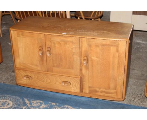 An Ercol blond elm sideboard enclosed by 3 doors and fitted single drawer 68cm x 114 cm x49 cm 