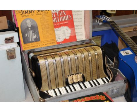 A Hohner Arietta IM piano accordion, cased. 
