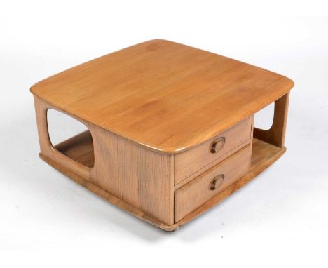 Ercol: a light elm ‘Pandora’ model no 735 square coffee table with two drawers, 80 x 40cms high.