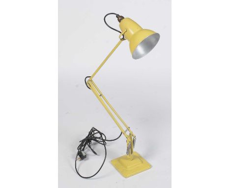 A vintage Herbert Terry anglepoise lamp in pale yellow, model 1227, by George Cawardine, 89cms fully extended.