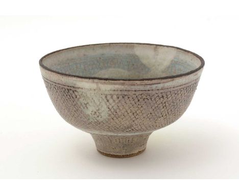 Dame Lucie Rie (1902-1995). A Stoneware Bowl with short tapering foot, the interior and exterior incised with fine trellis de