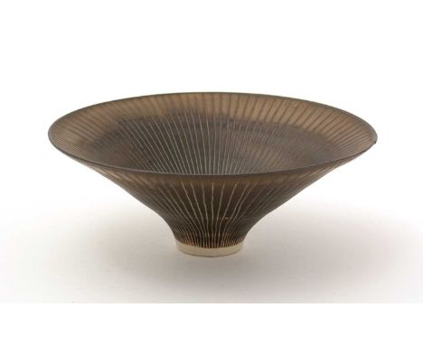 Dame Lucie Rie (1902-1995). A porcelain flared conical bowl, with fine incised radiating line decoration to the interior and 