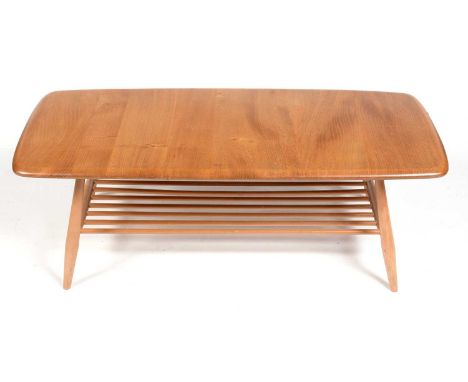 Ercol: a beech and elm model 459 coffee table, 104 x 45 x 37cms high.