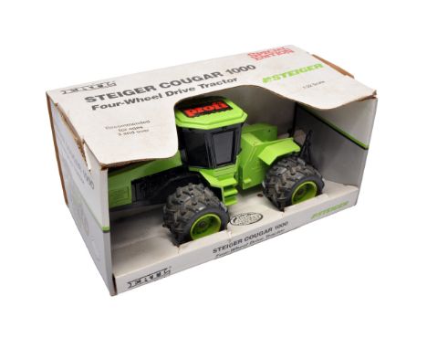 Ertl 1/32 diecast farm model issue comprising Steiger Cougar 1000 Tractor. Special Edition for Profi. With original box.