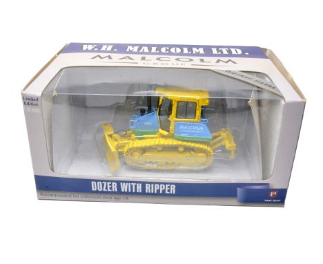 First Gear 1/50 diecast model construction issue comprising Komatsu Dozer with Ripper, in the livery of Malcolm. Looks to be 