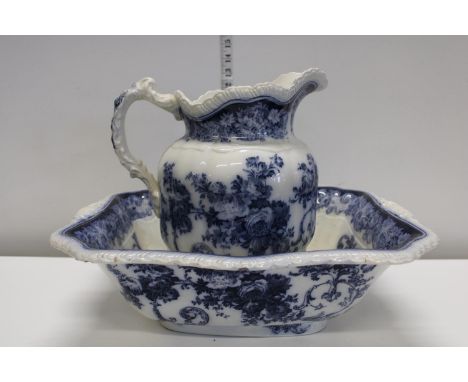 A antique blue and white jug and basin set. Postage unavailable 