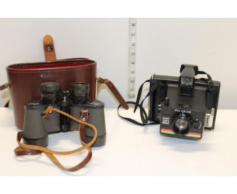 A vintage Polaroid camera &amp; pair of Ozeck binoculars 