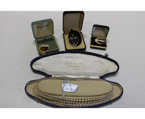 A selection of vintage costume jewellery and boxed set of pearls 