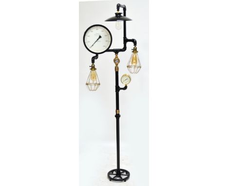 An unusual scratch built industrial "Steampunk" standard lamp with upper down light, twin basket shades, tubular frame and tr