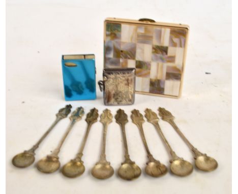 A George V hallmarked silver vesta case with bright cut decoration and monogram, Joseph Gloster, Birmingham 1912 and a set of