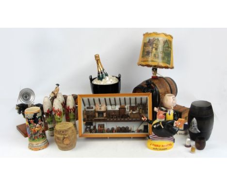 A group of ceramic breweriana including a Royal Doulton Sandeman bottle, a Carlton Ware "Martell Brandy" figure, a Beswick "D