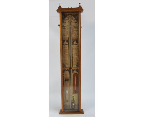 A late 19th century oak Admiral Fitzroys barometer with paper dial and original instruction label to the reverse, height 100c