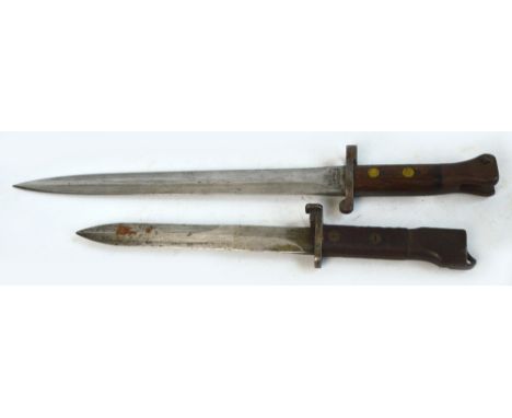 A Wilkinson London bayonet, lacking scabbard, length 42.5cm, and a further bayonet lacking scabbard, length 32cm (2).