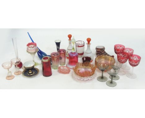 A group of coloured glass to include a late 19th century Bohemian clear and ruby glass faceted cup, finely etched with Contin