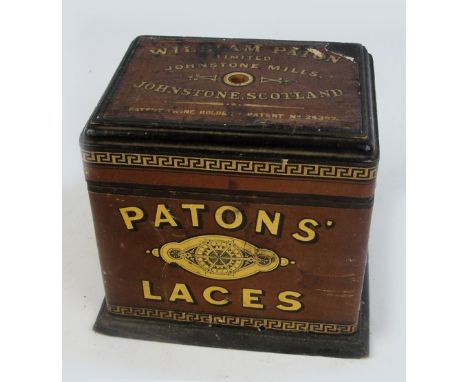 An unusual early 20th century wooden lace box inscribed "Paton's Laces", the cover with central hole within printed panel det