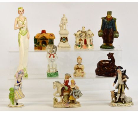 A group of 19th century ceramic figures including Staffordshire and Capodimonte examples, also a Continental nodding figure, 
