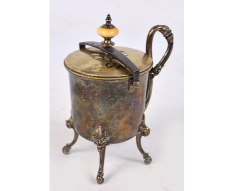 An unusual Victorian electroplated mug with detachable lid and with hinged fastener surmounted with turned ivory finial, with