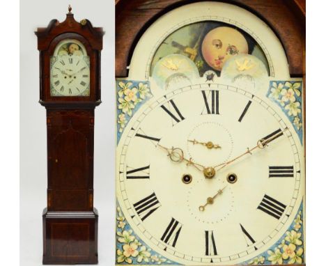 A 19th century mahogany and inlaid eight day longcase clock, the hood with broken swan neck pediment centred to the top with 