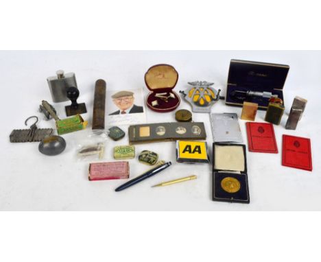 An interesting group of collector's items including a gramophone needle, a tin, a lighter, etc.