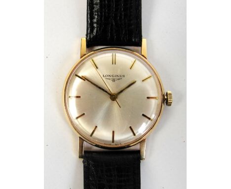LONGINES; a 1970's 9ct yellow gold cased gentleman's manual wind wristwatch, the silvered dial set with baton numerals, movem