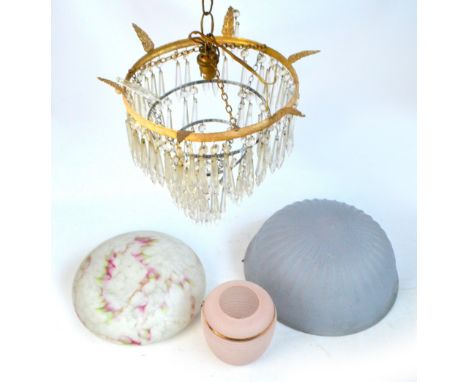 A frosted glass plaffonier with moulded classical motifs, diameter 45cm, a further example, a pink glass lamp shade and a fur