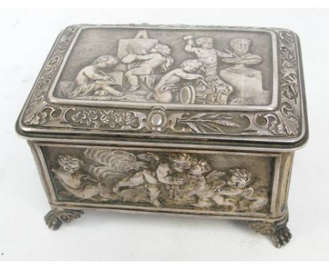 An electroplated jewellery box of rectangular form, decorated with cherubic scenes to each side and to the hinged lid, enclos