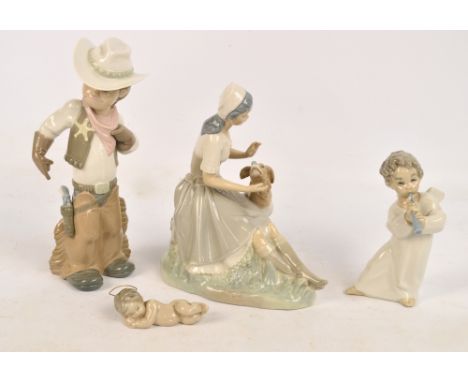 Three Lladro figures depicting a cowboy and two cherubic figures, also a Nao figure depicting a woman with a dog (af) (4). CO