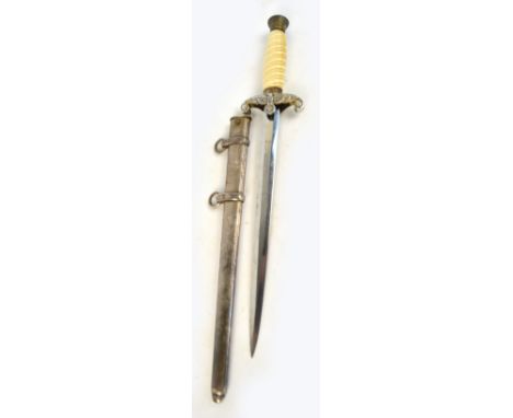 A WWII German Luftwaffe dagger with cream celluloid grip and E & F Horster of Solingen blade, with scabbard (wirework to grip