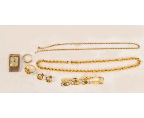 An 18ct white and yellow gold plated eternity ring, size K, a 9ct yellow gold rope twist chain necklace and a 9ct gold cased 