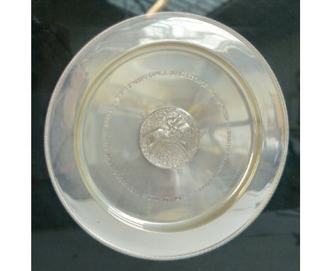STUART DEVLIN for CRAWFORD & GILBEY; a framed silver commemorative plate inscribed "Grundy 1975" with a central plaque portra