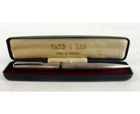 A cased Elizabeth II hallmarked silver Yard-O-Led ball pen with overall engine turned decoration, E Baker & Son, Birmingham 1