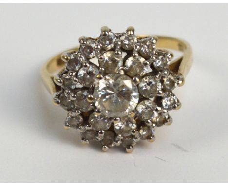 A 9ct yellow gold cubic zirconia cluster ring, size L.