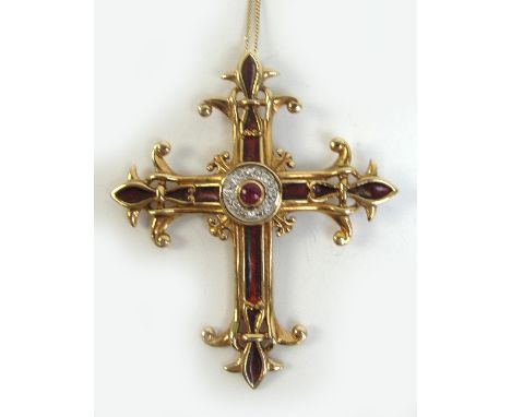 A 14ct gold red enamel decorated ruby and diamond cross pendant, length 5.2cm, approx 10.7g, suspended on a 9ct gold fine lin