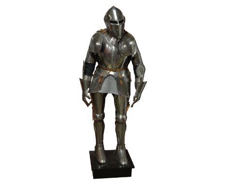 A reproduction full size suit of armour, raised on ebonised square base, height 174cm (excluding base). CONDITION REPORT: Sep