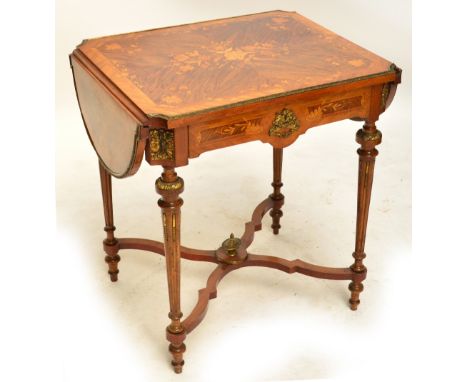 An early 20th century kingwood sofa/side table inlaid with flowers and scallop shells with shaped leaves edged with brass dec