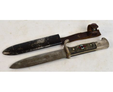 A WWII Nazi Hitler Youth dagger with enamelled emblem to the grip and metal scabbard, length 25cm.