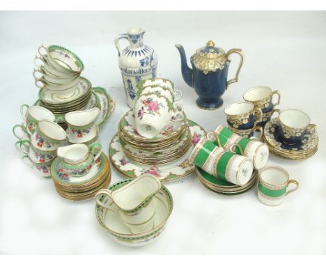 An Aynsley transfer floral decorated tea set comprising six cups and saucers, two spare saucers, cream jug, milk jug and suga