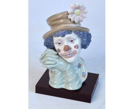 A Lladro bust of a sad looking clown, height 29cm.