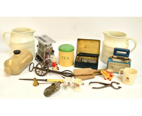 A small group of kitchenalia to include two large Adams ceramic jugs, a vintage chromed toaster by The General Electric Co. L
