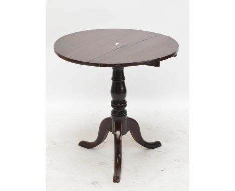 An early 19th century mahogany circular occasional table, on ring turned column and three cabriole legs, diameter 74cm, heigh