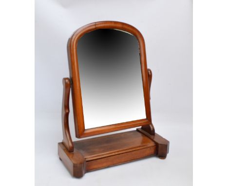 A Victorian mahogany swing toilet mirror with trinket box to base, height 60cm.