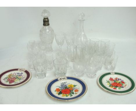 A quantity of various clear cut glasses and beakers, a group of five decanters (one af), a finely etched ewer, an oil lamp sh