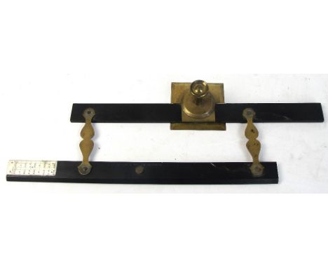 NORIE & WILSON; a hinged parallel rule with integral brass compass for navigation and ivory scale, length 38cm.