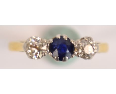 An 18ct yellow gold sapphire and diamond ring with platinum claw setting, size M.