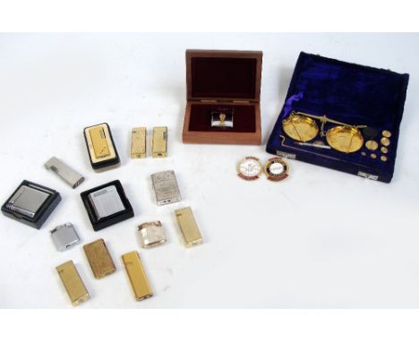 A collection of various lighters to include two Ronson examples, and a Zippo Collectors Edition World Cup FIFA Trophy example