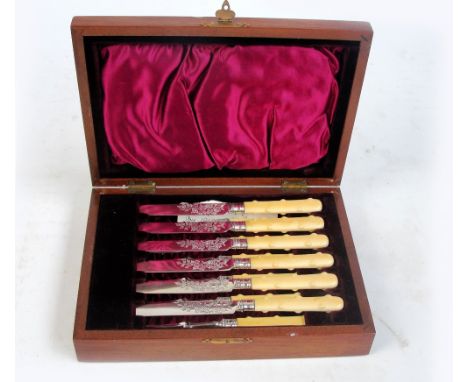 A set of six mahogany cased Victorian hallmarked silver bladed fruit knives and forks with gnarled ivory handles, Atkin Bros,