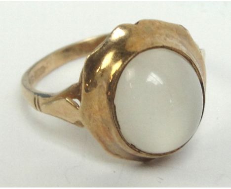 A 9ct gold moonstone ring set with oval cabochon in pierced mount, size Q, approx 4g.
