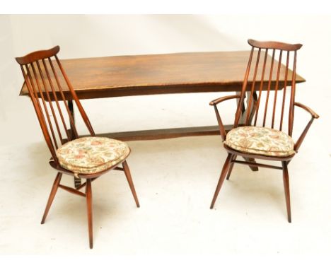 A set of six Ercol chairs (4+2), and a reproduction oak refectory table, top 182 x 74cm (7).